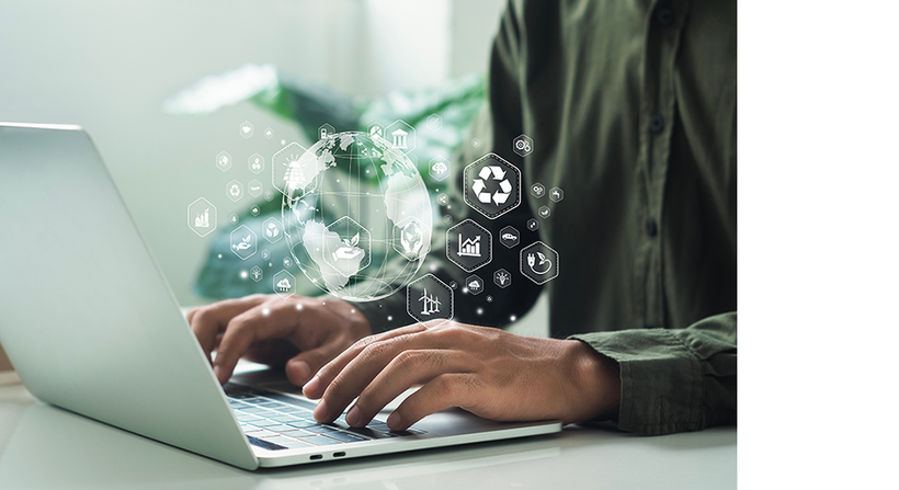 Businessman typing computer with virtual icons about environment, analysis, investment, green business