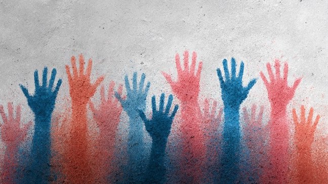 Hands raised in protest or support with red and blue color scheme on gray background