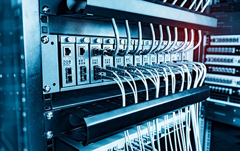 Fiber Optic cables connected to optic ports and UTP, Network cables connected to ethernet ports